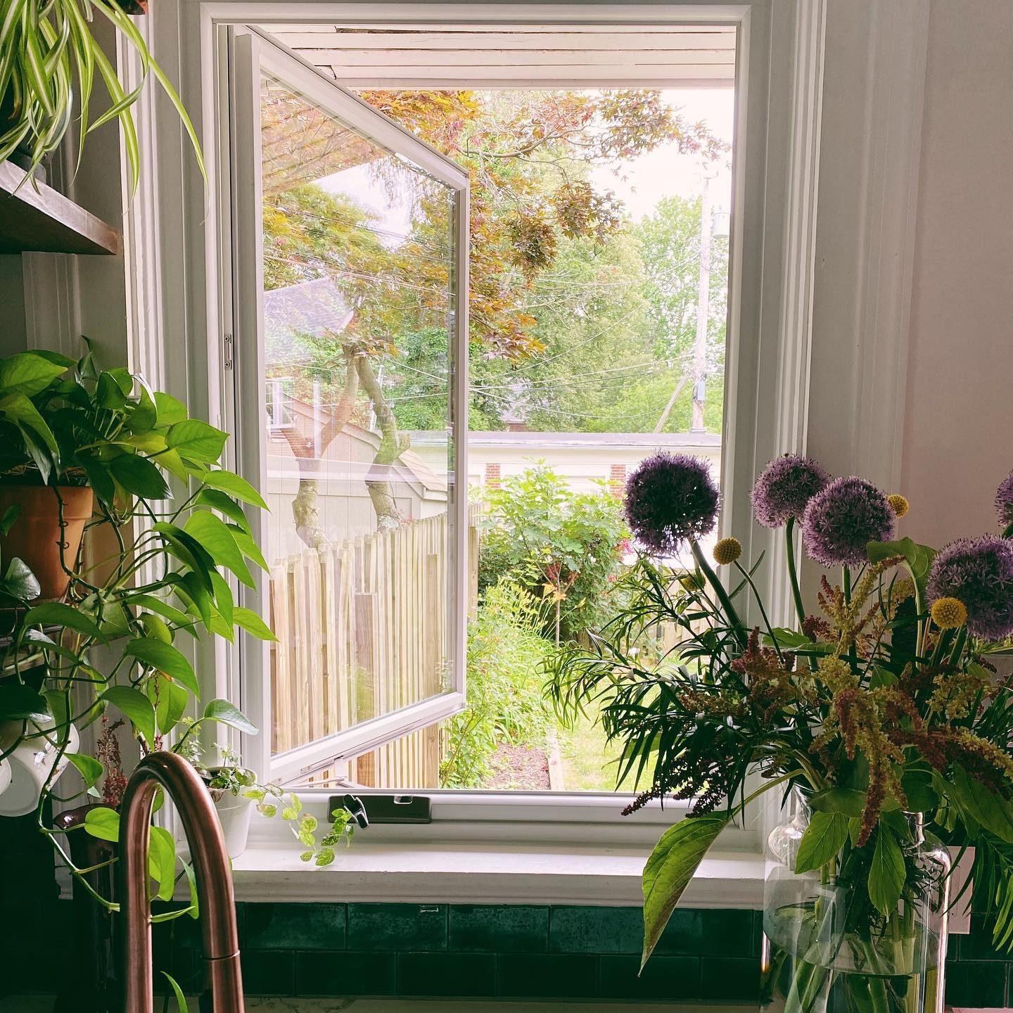 Casement window open over kitchen sink
