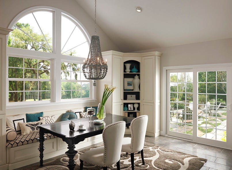 Milgard Tuscany Series vinyl windows installed in an elegant dining room